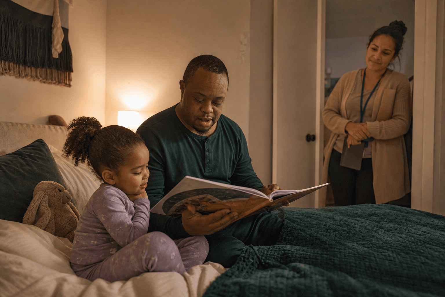 A Black father with Down syndrome reads a bedtime story to his daughter while a parenting coach observes from the doorway.